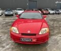 Красный Хендай Купе, объемом двигателя 16 л и пробегом 250 тыс. км за 4190 $, фото 1 на Automoto.ua