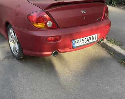 Красный Хендай Купе, объемом двигателя 1.6 л и пробегом 173 тыс. км за 4000 $, фото 6 на Automoto.ua