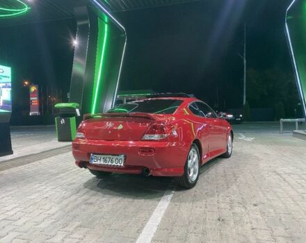 Красный Хендай Купе, объемом двигателя 2 л и пробегом 230 тыс. км за 5280 $, фото 2 на Automoto.ua