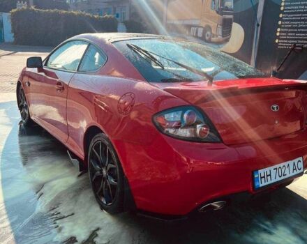 Красный Хендай Купе, объемом двигателя 2.7 л и пробегом 230 тыс. км за 5999 $, фото 2 на Automoto.ua