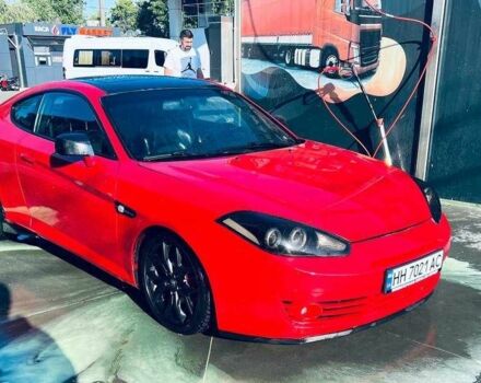 Красный Хендай Купе, объемом двигателя 2.7 л и пробегом 230 тыс. км за 6600 $, фото 1 на Automoto.ua