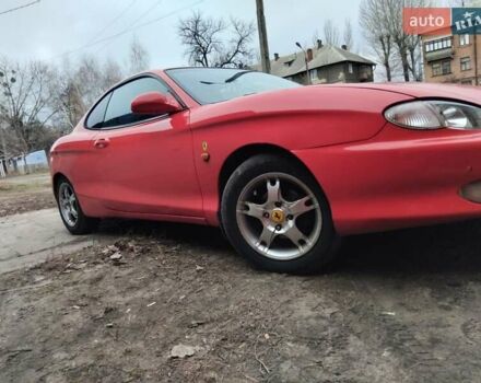 Красный Хендай Купе, объемом двигателя 2 л и пробегом 250 тыс. км за 2150 $, фото 1 на Automoto.ua