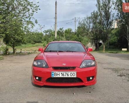 Красный Хендай Купе, объемом двигателя 1.98 л и пробегом 230 тыс. км за 5799 $, фото 1 на Automoto.ua
