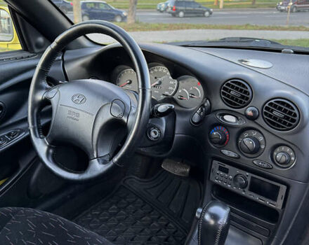 Желтый Хендай Купе, объемом двигателя 2 л и пробегом 206 тыс. км за 4400 $, фото 19 на Automoto.ua