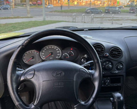 Желтый Хендай Купе, объемом двигателя 2 л и пробегом 206 тыс. км за 4400 $, фото 12 на Automoto.ua