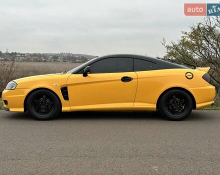 Желтый Хендай Купе, объемом двигателя 1.98 л и пробегом 222 тыс. км за 4800 $, фото 8 на Automoto.ua