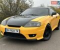 Желтый Хендай Купе, объемом двигателя 1.98 л и пробегом 222 тыс. км за 4800 $, фото 2 на Automoto.ua