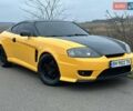 Желтый Хендай Купе, объемом двигателя 1.98 л и пробегом 222 тыс. км за 4800 $, фото 13 на Automoto.ua