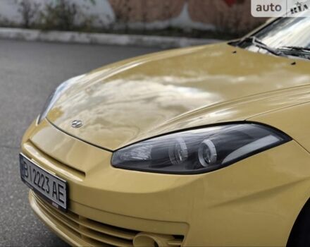Жовтий Хендай Купе, об'ємом двигуна 2 л та пробігом 198 тис. км за 7199 $, фото 15 на Automoto.ua