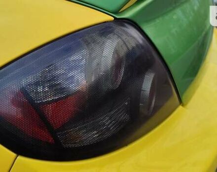Желтый Хендай Купе, объемом двигателя 2 л и пробегом 189 тыс. км за 6300 $, фото 9 на Automoto.ua