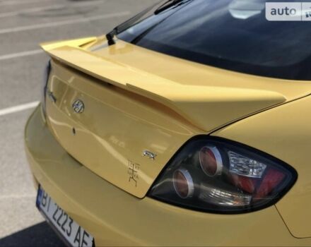 Жовтий Хендай Купе, об'ємом двигуна 2 л та пробігом 198 тис. км за 7199 $, фото 20 на Automoto.ua