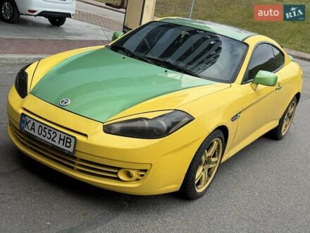 Желтый Хендай Купе, объемом двигателя 1.98 л и пробегом 205 тыс. км за 3999 $, фото 1 на Automoto.ua