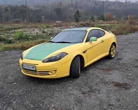 Жовтий Хендай Купе, об'ємом двигуна 1.98 л та пробігом 205 тис. км за 7200 $, фото 1 на Automoto.ua