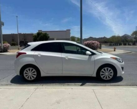 Білий Хендай Елантра, об'ємом двигуна 2 л та пробігом 77 тис. км за 6300 $, фото 4 на Automoto.ua