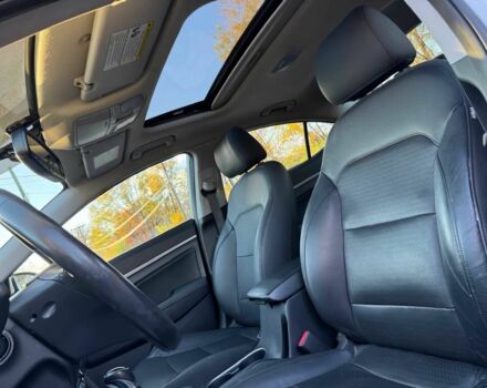 Білий Хендай Елантра, об'ємом двигуна 2 л та пробігом 53 тис. км за 10000 $, фото 10 на Automoto.ua