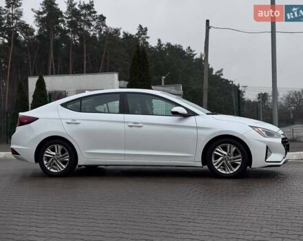 Білий Хендай Елантра, об'ємом двигуна 2 л та пробігом 84 тис. км за 13600 $, фото 3 на Automoto.ua