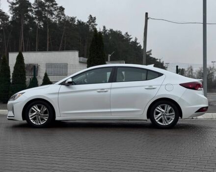 Білий Хендай Елантра, об'ємом двигуна 2 л та пробігом 84 тис. км за 13600 $, фото 6 на Automoto.ua