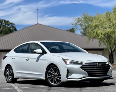 Белый Хендай Элантра, объемом двигателя 2 л и пробегом 34 тыс. км за 9400 $, фото 1 на Automoto.ua