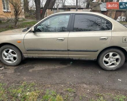 Бежевий Хендай Елантра, об'ємом двигуна 2 л та пробігом 294 тис. км за 3400 $, фото 3 на Automoto.ua