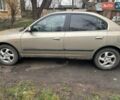 Бежевий Хендай Елантра, об'ємом двигуна 2 л та пробігом 294 тис. км за 3400 $, фото 3 на Automoto.ua