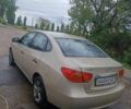 Бежевий Хендай Елантра, об'ємом двигуна 1.6 л та пробігом 142 тис. км за 6900 $, фото 3 на Automoto.ua