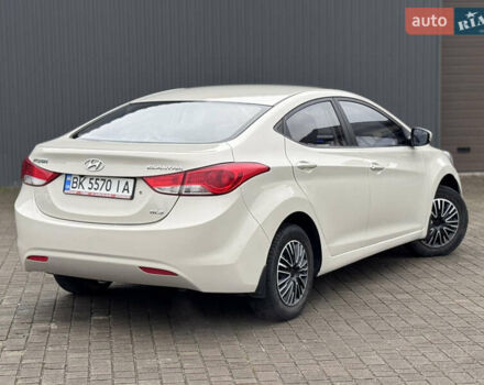 Бежевий Хендай Елантра, об'ємом двигуна 1.6 л та пробігом 185 тис. км за 9850 $, фото 12 на Automoto.ua