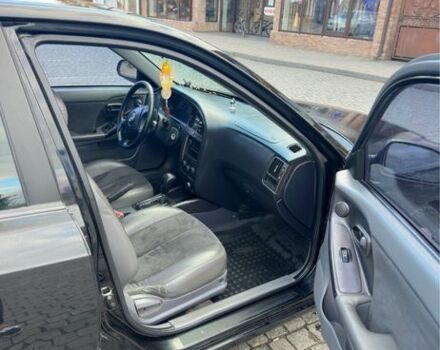 Хендай Элантра 2004 в Хусте на Automoto.ua Черный Хендай Элантра, объемом двигателя 2 л и пробегом 179 тыс. км за 3038 $, фото 4 на Automoto.ua