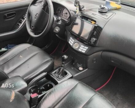 Черный Хендай Элантра, объемом двигателя 2 л и пробегом 180 тыс. км за 4000 $, фото 6 на Automoto.ua