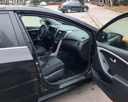 Черный Хендай Элантра, объемом двигателя 2 л и пробегом 135 тыс. км за 8500 $, фото 4 на Automoto.ua