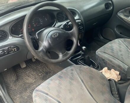 Черный Хендай Элантра, объемом двигателя 1.8 л и пробегом 400 тыс. км за 1500 $, фото 4 на Automoto.ua