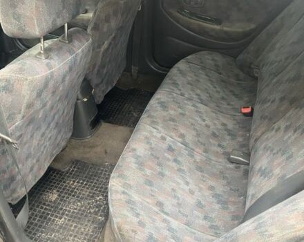 Черный Хендай Элантра, объемом двигателя 1.8 л и пробегом 400 тыс. км за 1500 $, фото 5 на Automoto.ua