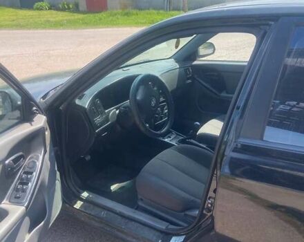 Черный Хендай Элантра, объемом двигателя 1.6 л и пробегом 295 тыс. км за 2750 $, фото 1 на Automoto.ua