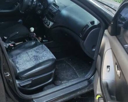 Черный Хендай Элантра, объемом двигателя 1.59 л и пробегом 280 тыс. км за 4500 $, фото 2 на Automoto.ua