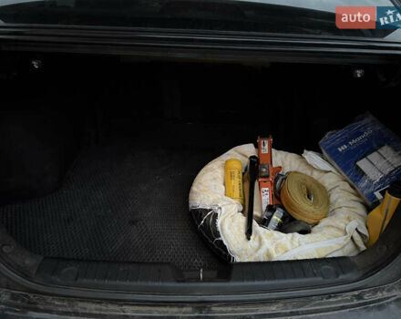 Черный Хендай Элантра, объемом двигателя 1.59 л и пробегом 264 тыс. км за 5800 $, фото 24 на Automoto.ua