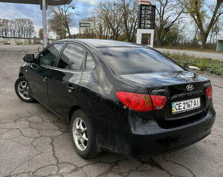 Черный Хендай Элантра, объемом двигателя 1.59 л и пробегом 264 тыс. км за 5800 $, фото 6 на Automoto.ua