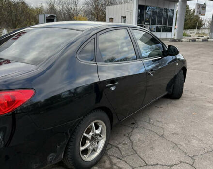 Черный Хендай Элантра, объемом двигателя 1.59 л и пробегом 264 тыс. км за 5800 $, фото 10 на Automoto.ua
