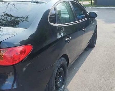 Черный Хендай Элантра, объемом двигателя 1.59 л и пробегом 280 тыс. км за 4500 $, фото 4 на Automoto.ua