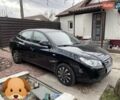 Черный Хендай Элантра, объемом двигателя 1.6 л и пробегом 165 тыс. км за 5800 $, фото 1 на Automoto.ua