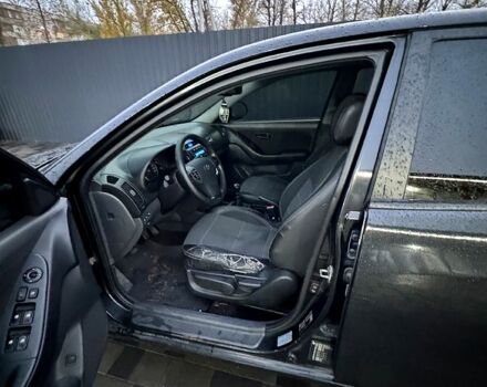 Черный Хендай Элантра, объемом двигателя 1.6 л и пробегом 261 тыс. км за 4799 $, фото 11 на Automoto.ua