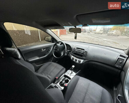 Черный Хендай Элантра, объемом двигателя 1.59 л и пробегом 242 тыс. км за 5999 $, фото 9 на Automoto.ua