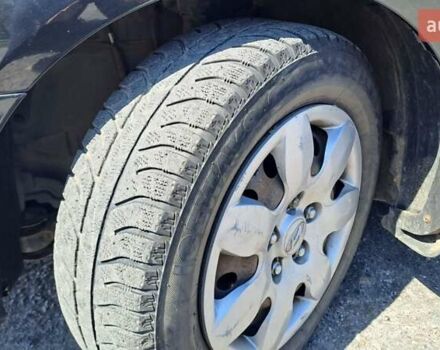 Черный Хендай Элантра, объемом двигателя 1.59 л и пробегом 255 тыс. км за 5000 $, фото 7 на Automoto.ua