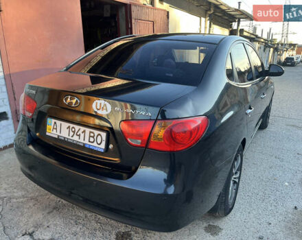 Черный Хендай Элантра, объемом двигателя 1.59 л и пробегом 240 тыс. км за 6257 $, фото 6 на Automoto.ua