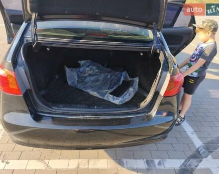 Черный Хендай Элантра, объемом двигателя 1.59 л и пробегом 213 тыс. км за 5300 $, фото 8 на Automoto.ua