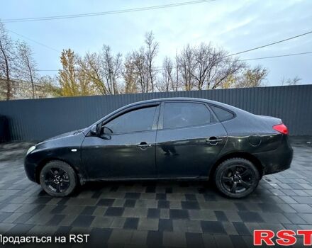 Черный Хендай Элантра, объемом двигателя 1.6 л и пробегом 261 тыс. км за 4799 $, фото 2 на Automoto.ua