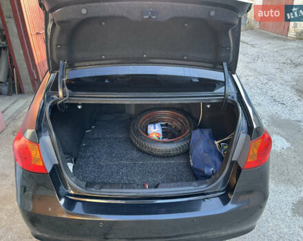 Черный Хендай Элантра, объемом двигателя 1.59 л и пробегом 240 тыс. км за 6257 $, фото 10 на Automoto.ua