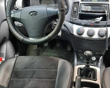 Хендай Элантра 2008 в Хмельницком на Automoto.ua Черный Хендай Элантра, объемом двигателя 1.6 л и пробегом 150 тыс. км за 5700 $, фото 4 на Automoto.ua