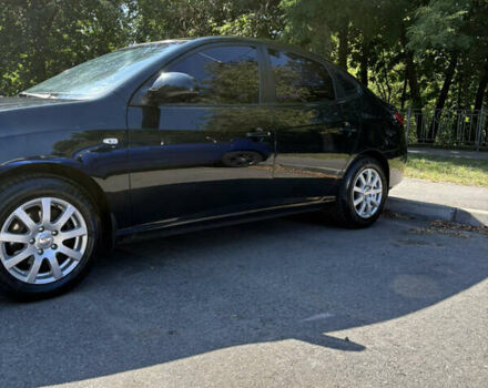 Черный Хендай Элантра, объемом двигателя 1.59 л и пробегом 113 тыс. км за 6500 $, фото 4 на Automoto.ua