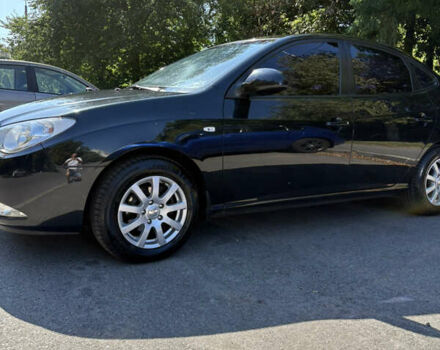 Черный Хендай Элантра, объемом двигателя 1.59 л и пробегом 113 тыс. км за 6500 $, фото 3 на Automoto.ua