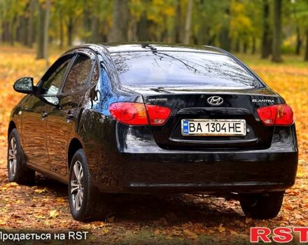 Черный Хендай Элантра, объемом двигателя 1.6 л и пробегом 223 тыс. км за 5999 $, фото 5 на Automoto.ua