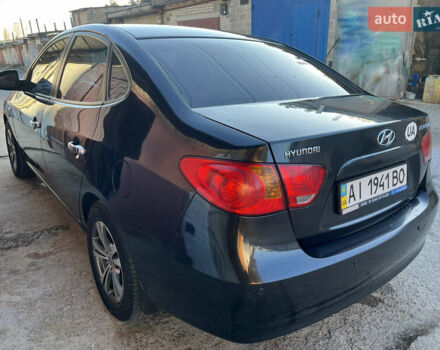 Черный Хендай Элантра, объемом двигателя 1.59 л и пробегом 240 тыс. км за 6257 $, фото 5 на Automoto.ua